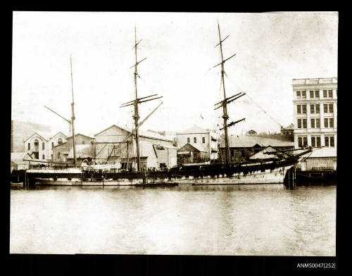 Barque SCOTTISH WIZARD docked at a wharf