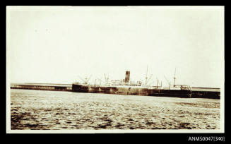 SS NORTHUMBERLAND docked at a wharf