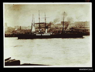 View of a Howard Smith Line Steamship berthing at a wharf