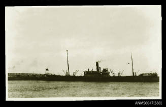 SS HOKKAI MARU docked at a wharf with Gunnersen, Nosworthy Ltd warehouse in background