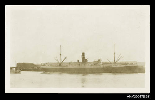 View of the top half of SS KAZEMBE docked at a wharf