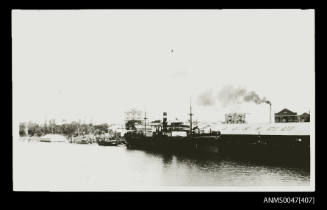 Cargo steamship possibly MACUMBA at an Australasian United Steam Navigation Co Ltd (AUSN) wharf 