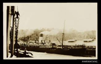 SS BOMBALA beside a wharf