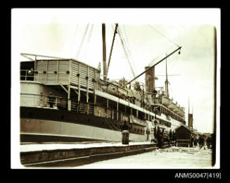 Passenger liner SS WANDILLA 7785 tonnes berthed at a wharf - built in 1912, owned by Adelaide Steam Ship Company Ltd