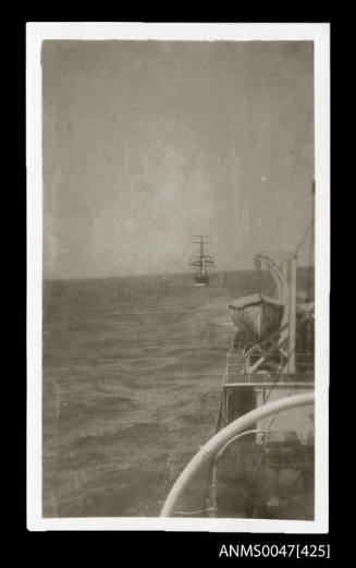 View of the three masted ship GARTHFORCE under tow in the Indian Ocean