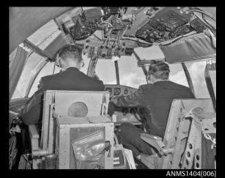 Pilots in the cockpit of a flying boat