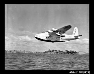 Ansett Airways flying boat taking off from Sydney Harbour