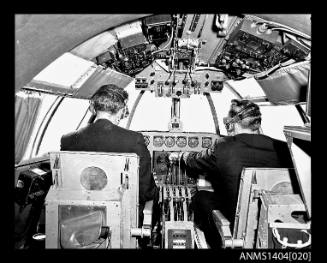 Ansett Airways pilots in the cockpit of a flying boat