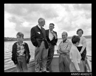 People standing on a vessel, Sydney Harbour