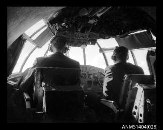 Pilots inside the cockpit of an Ansett Airways flying boat