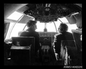 Pilots inside the cockpit of an Ansett Airways flying boat