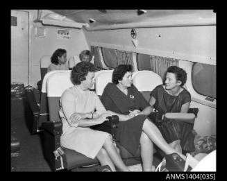 Passengers inside the cabin of an Ansett Airways flying boat