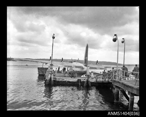 Passengers boarding an Ansett Airways flying boat at Rose Bay