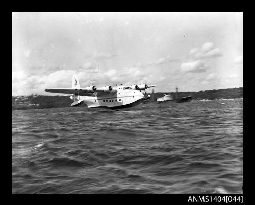 Ansett Airways flying boat PACIFIC CHIEFTAIN taking off from Sydney Harbour