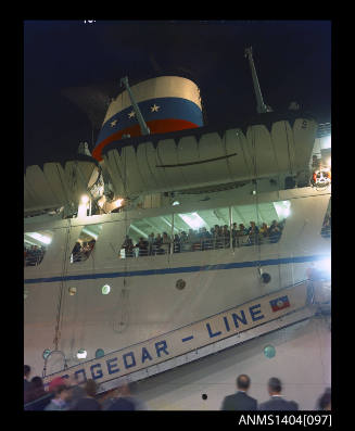 Photographic transparency showing passengers aboard the ship FLAVIA about to depart