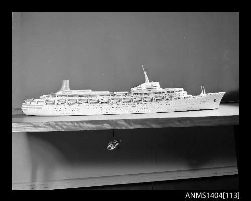 Photographic negative showing a scale model of the ship CANBERRA