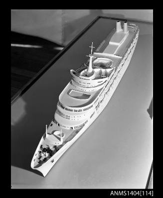 Photographic negative showing a scale model of the ship CANBERRA