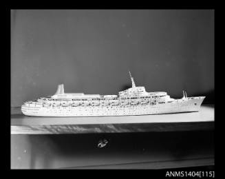 Photographic negative showing a scale model of the ship CANBERRA