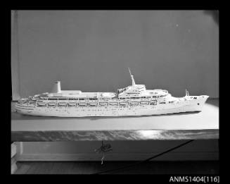 Photographic negative showing a scale model of the ship CANBERRA