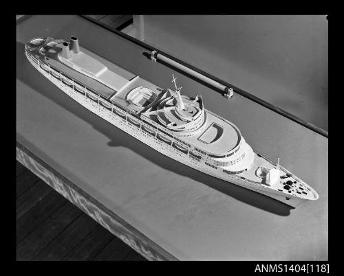 Photographic negative showing a scale model of the ship CANBERRA