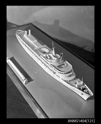 Photographic negative showing a scale model of the ship CANBERRA