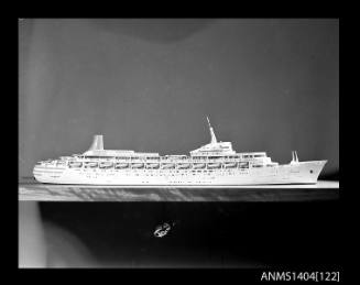 Photographic negative showing a scale model of the ship CANBERRA