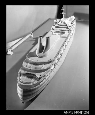 Photographic negative showing a scale model of the ship CANBERRA