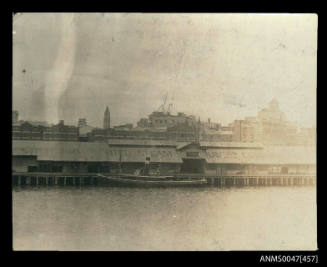 A tugboat alongside the Australiasian United SN co ltd wharf in sydney