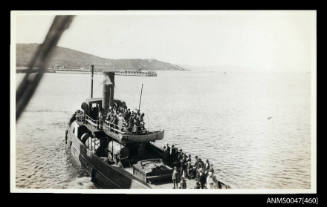 Tugboat BRUCE crowded with men and women