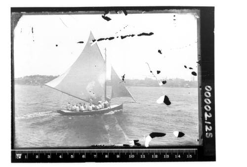 Unidentified half-decker sailing on Sydney Harbour