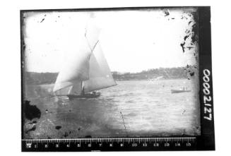 View of a cutter and rowboat on Sydney Harbour