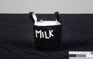 Model milk pail from model of Bonegilla Migrant Reception Centre