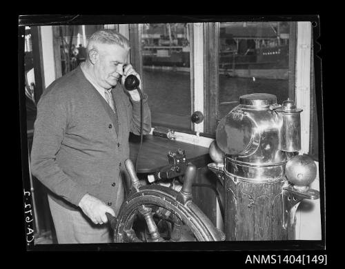 Photographic negative showing AWA radio telephone equipment on board a tugboat