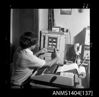 Photographic negative showing communications equipment on board a tug for the Sydney to Hobart Yacht Race