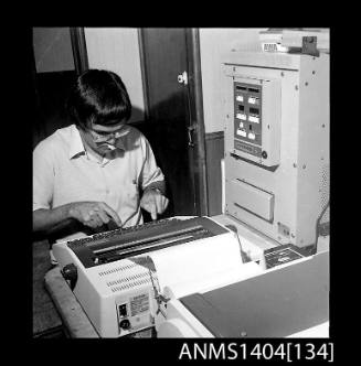 Photographic negative showing communications equipment on board a tug for the Sydney to Hobart Yacht Race