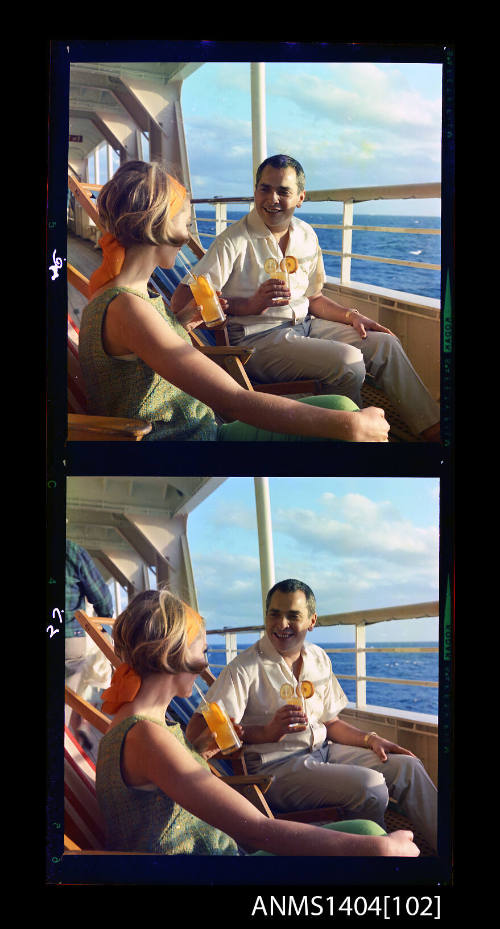 Photographic transparency strip featuring two images of a couple seated on deck aboard the ship FLAVIA