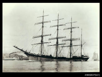 Photograph of steel four masted barque HOLT HIL at anchor in harbour, with port side view depicted