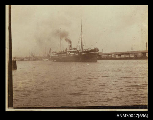 SS ARAWATTA passenger ship in harbour under way off wharf on port side