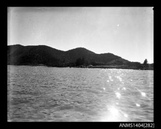 Photographic negative showing the jetty and surrounding landscape at Lord Howe Island