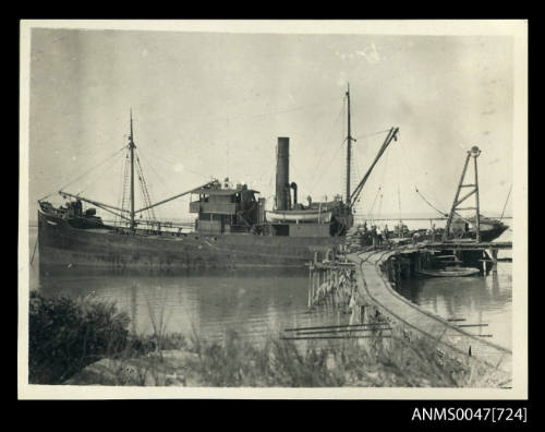 SS KURNALPI berthed at a small jetty off port side