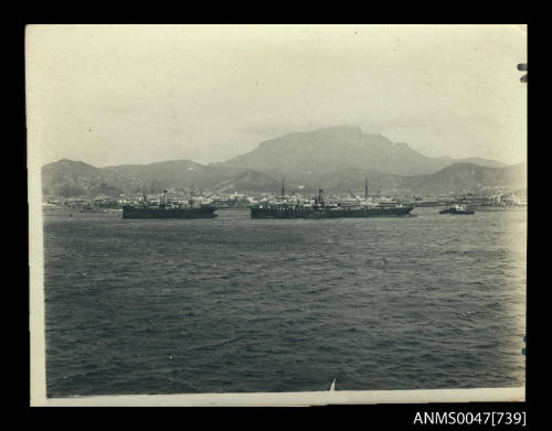 SS TRUMF at anchor in harbour