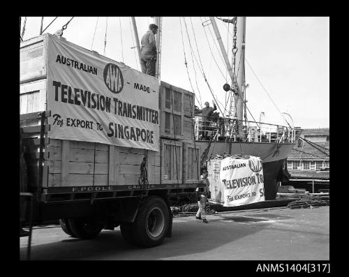 Photographic negative showing loading of the first AWA television transmitter for export to Singapore