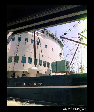 Photographic transparency showing cargo being loaded onto the ship TAIYUAN