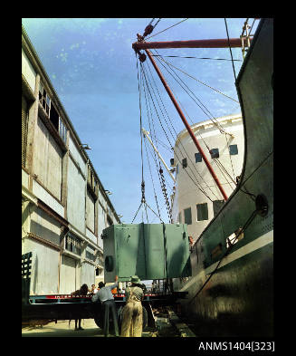 Photographic transparency showing cargo being loaded onto the ship TAIYUAN