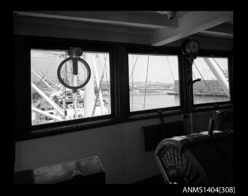 Photographic negative showing a view of Pyrmont and Glebe Island Bridge from inside the bridge of ship GLADSTONE STAR