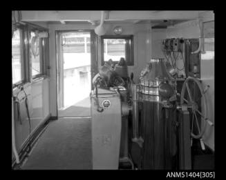 Photographic negative showing navigation equipment and controls on the bridge of ship GLADSTONE STAR