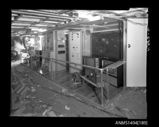 Photographic negative showing set up of an AWA company display on board a trade ship