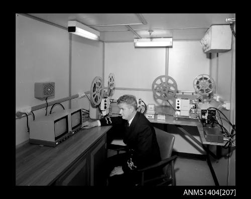 Photographic negative showing monitors and recording equipment on board the ship AUSTRALIAN TRADER