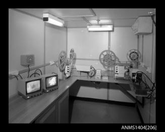 Photographic negative showing monitors and recording equipment on board the ship AUSTRALIAN TRADER