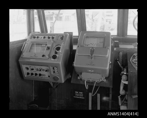 Photographic negative showing navigational equipment on a boat